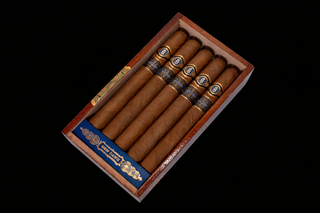 Open Wooden CIgar box with 15 cigars of Avowed New Dawn Corona Gorda