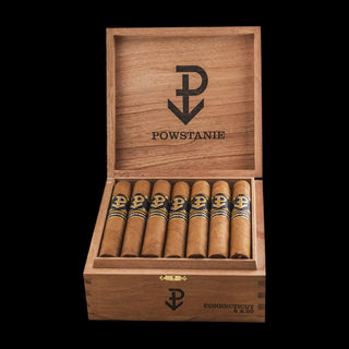 Wooden box of cigars with 'Powstanie' branding on a black background