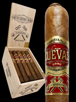 A premium cigar product display featuring an open light wood box containing several cigars, alongside a single large cigar with a red and gold label reading 'Casa CUEVAS' and 'LA MANIARRIA'.