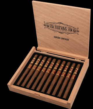 Open wooden box of Cuevas cigars on a black background