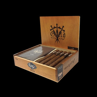 Open wooden cigar box with cigars inside on a black background