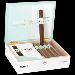 Open box of Crux cigars with a single cigar displayed