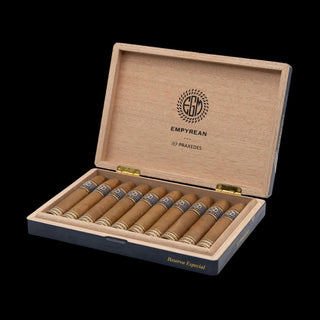 Open wooden cigar box with cigars inside on a black background