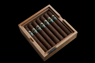 Box of cigars with visible branding on a black background