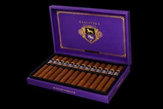 Open purple cigar box with cigars inside on a black background