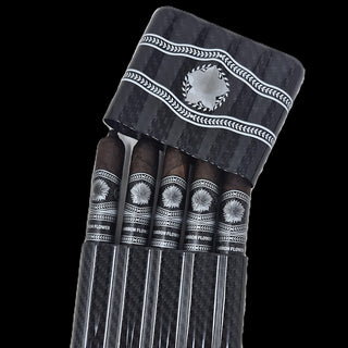 Five dark cigars arranged vertically in a clear cylindrical case with a black-and-gray patterned lid, photographed against a solid black background.