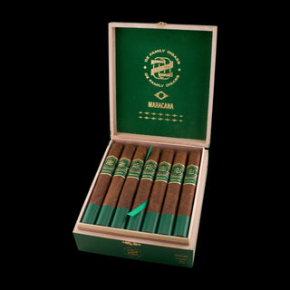 Open box of cigars with green band and visible brand logo on a white background