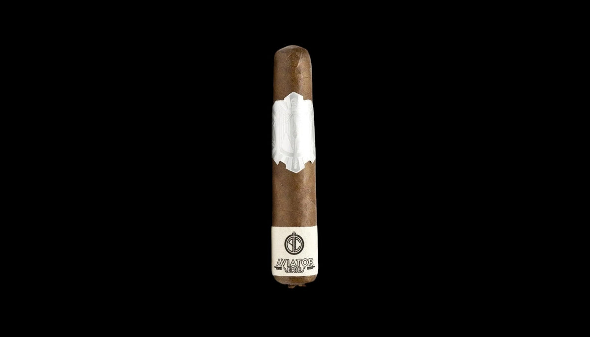 Cigar with a visible label on a black background