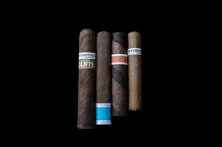 Four Cigars on a black background 